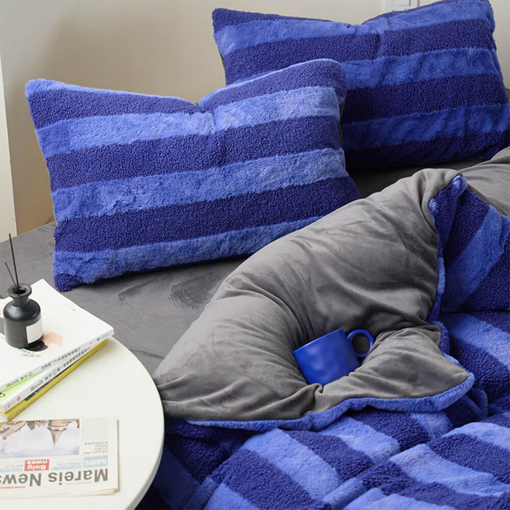 Juego de sábanas a rayas acogedoras de doble cara